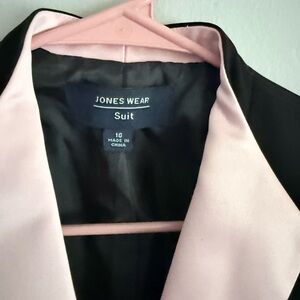 Jones Wear Black Suit with Pink Accents